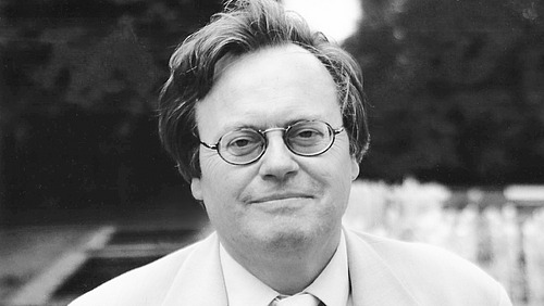 A man looks into the camera.