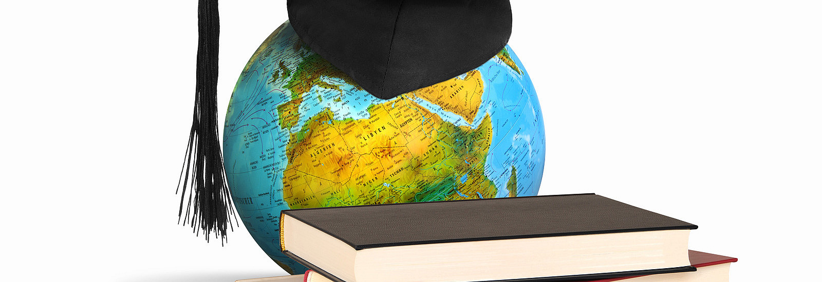 Globus mit Doktorhut und Büchern