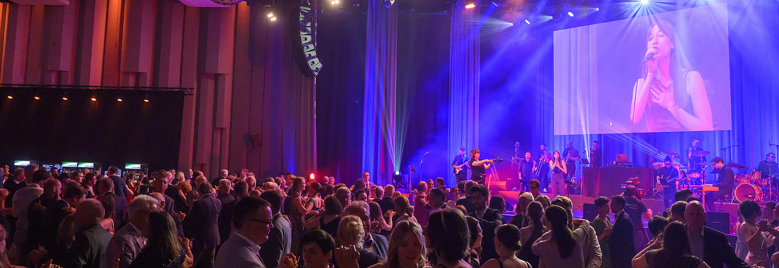 A ballroom full of people celebrating