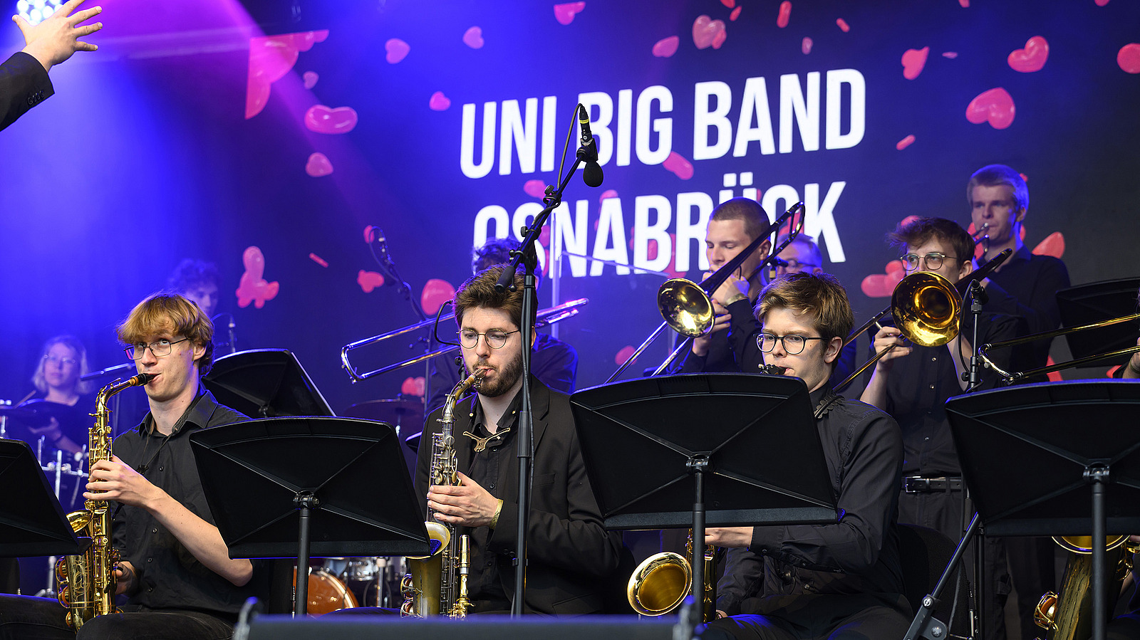 Several musicians on one big stage