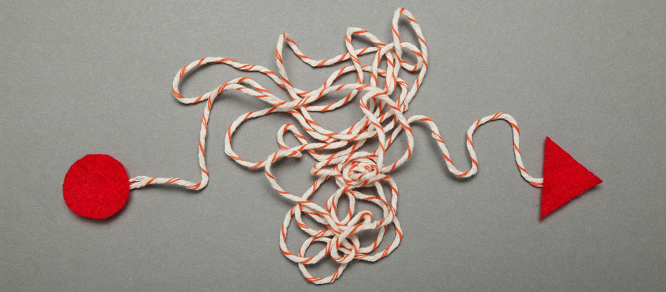 Band mit Kreis an einem und Pfeil an anderem Ende