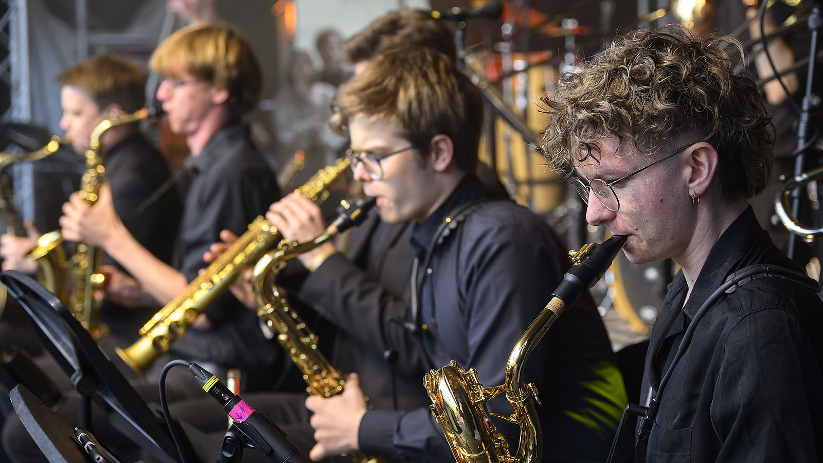 Several brass players on one stage