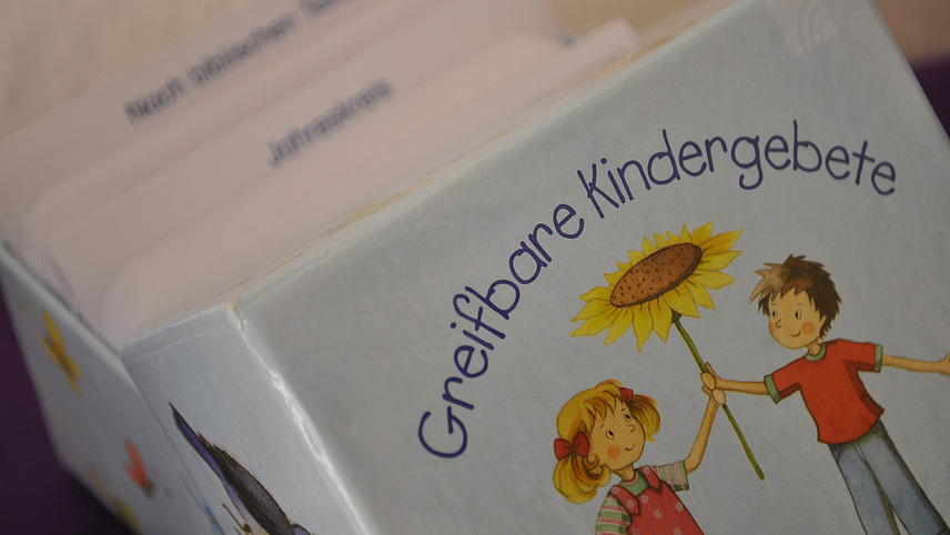 Close-up of the book “ Graspable children's prayers”.