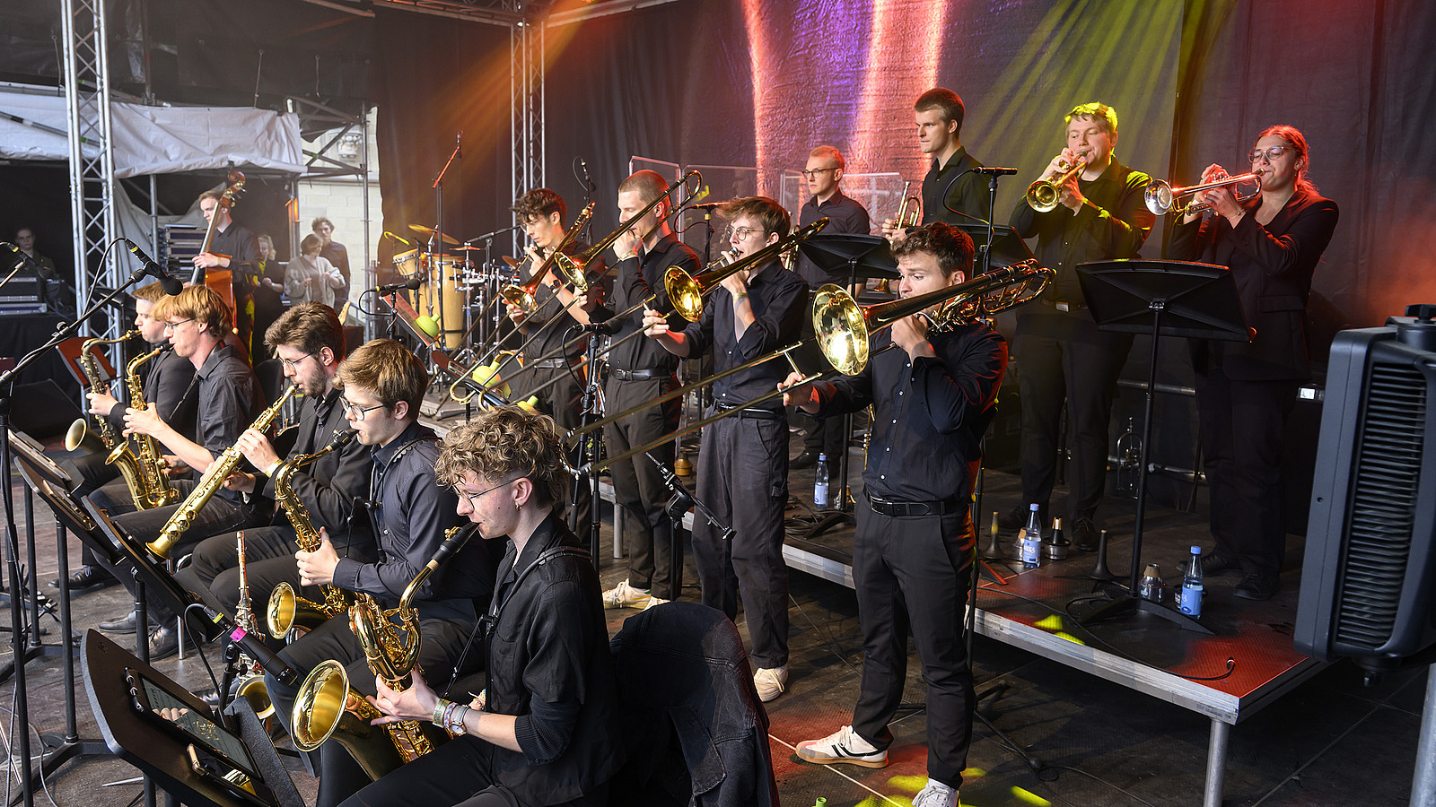 Several brass players on one stage