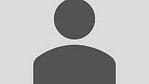 This is a placeholder image for a portrait: a dark gray pictogram of a person against a solid gray background.