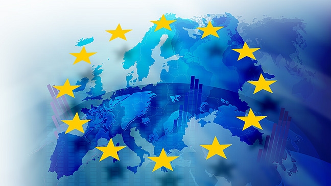 Globe with a view of Europe, above it EU stars and bars