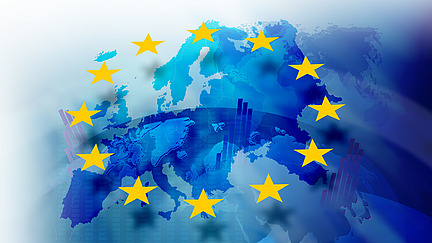 Globe with a view of Europe, above it EU stars and bars