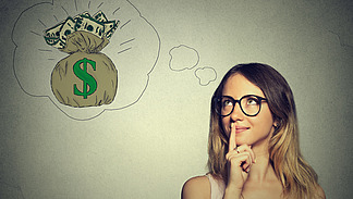 A woman with long hair and glasses holds her finger to her lips and a bag of money can be seen in a thought bubble.