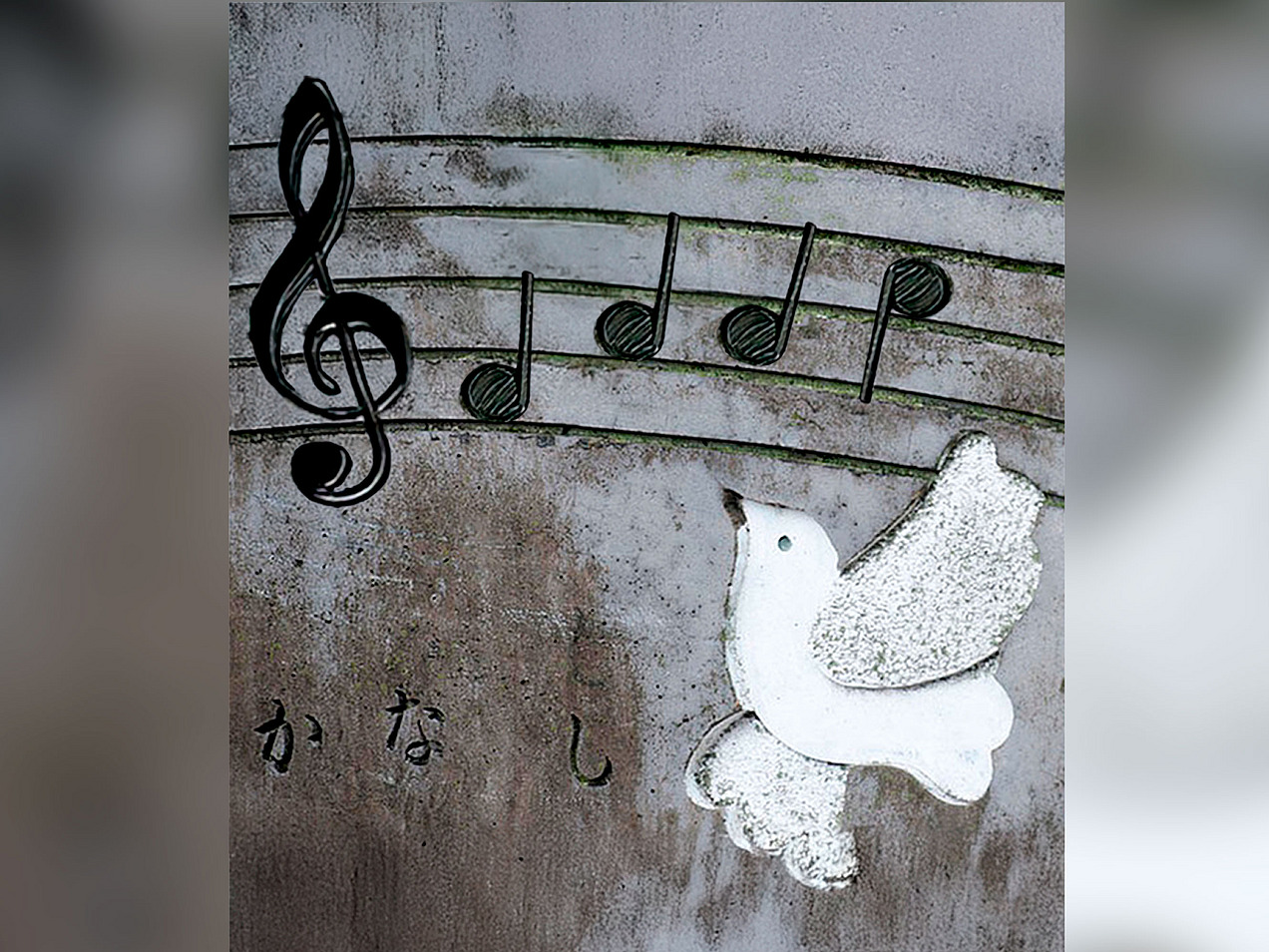 Some musical notes with a treble clef and a dove can be seen.