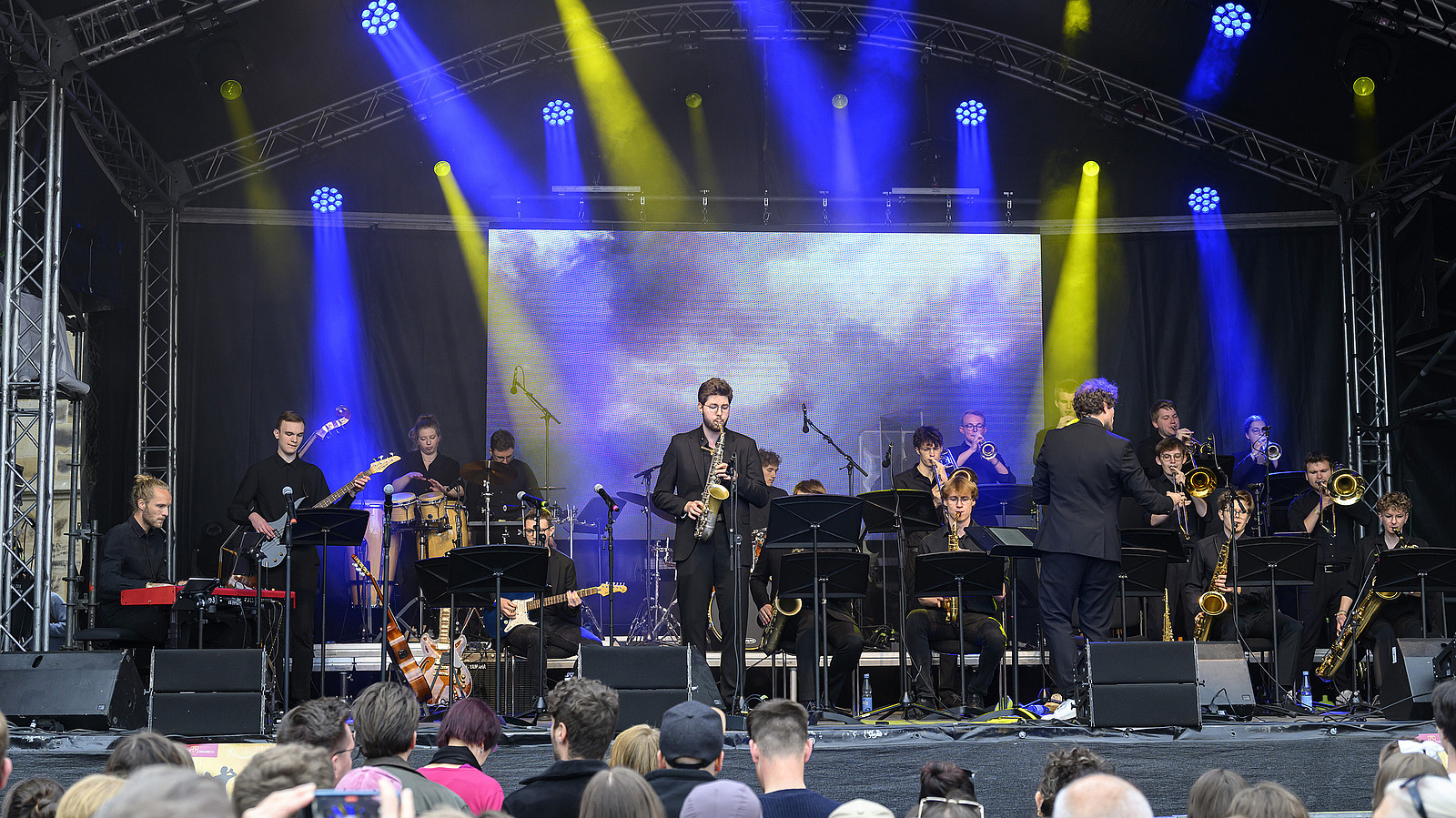 Several musicians on one big stage
