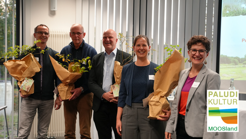 Moosland Gruppe posiert für ein Foto